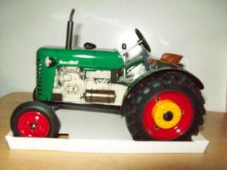 This ad is for a KOVAP 125, Zetor 25A tin windup toy tractor, still 