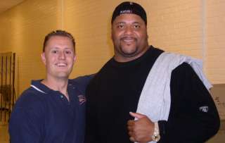 Gilbert Brown with Jeff, the owner of Jeffs Sports, at an autograph 