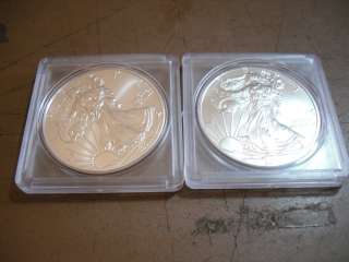 LOT OF 2 .999 SILVER 2011 AMERICAN EAGLE DOLLAR COINS GREAT SHAPE 