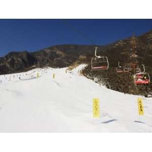 Ski Lift Taking Skiers Up to the Slopes at Shijinglong Ski Resort 