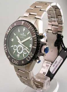   round green face w rotating bezel silver arrow shaped second hand