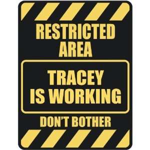   RESTRICTED AREA TRACEY IS WORKING  PARKING SIGN: Home 