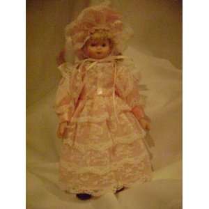  9 Porcelain Doll with Pink Satin and Lace Victorian Dress 