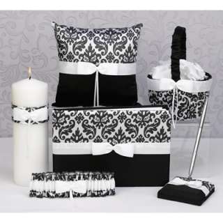 Shiny pillow with black and white damask satin on top and solid black 