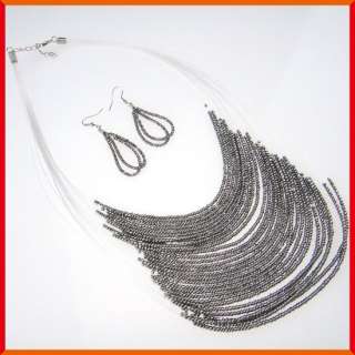 T314 Multi strand black seed bead necklace earrings set  