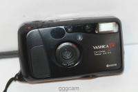 YASHICA T4 . 35 MM FILM CAMERA CARL ZEISS T * LENS  