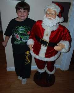 50 (about 4 feet tall) Santa that sings Jingle Bells, Santa Claus 