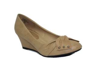 This new style round toe wedge has bow like design with studs on vamp.